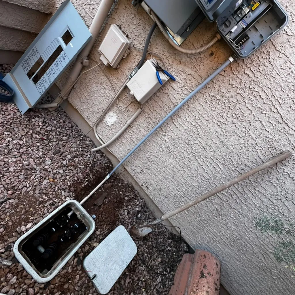 Irrigation controller and new lines run clean on the wall.