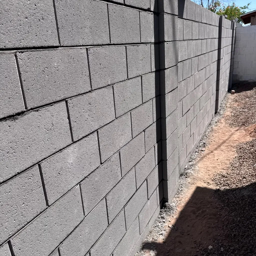 Block wall going up, course by course