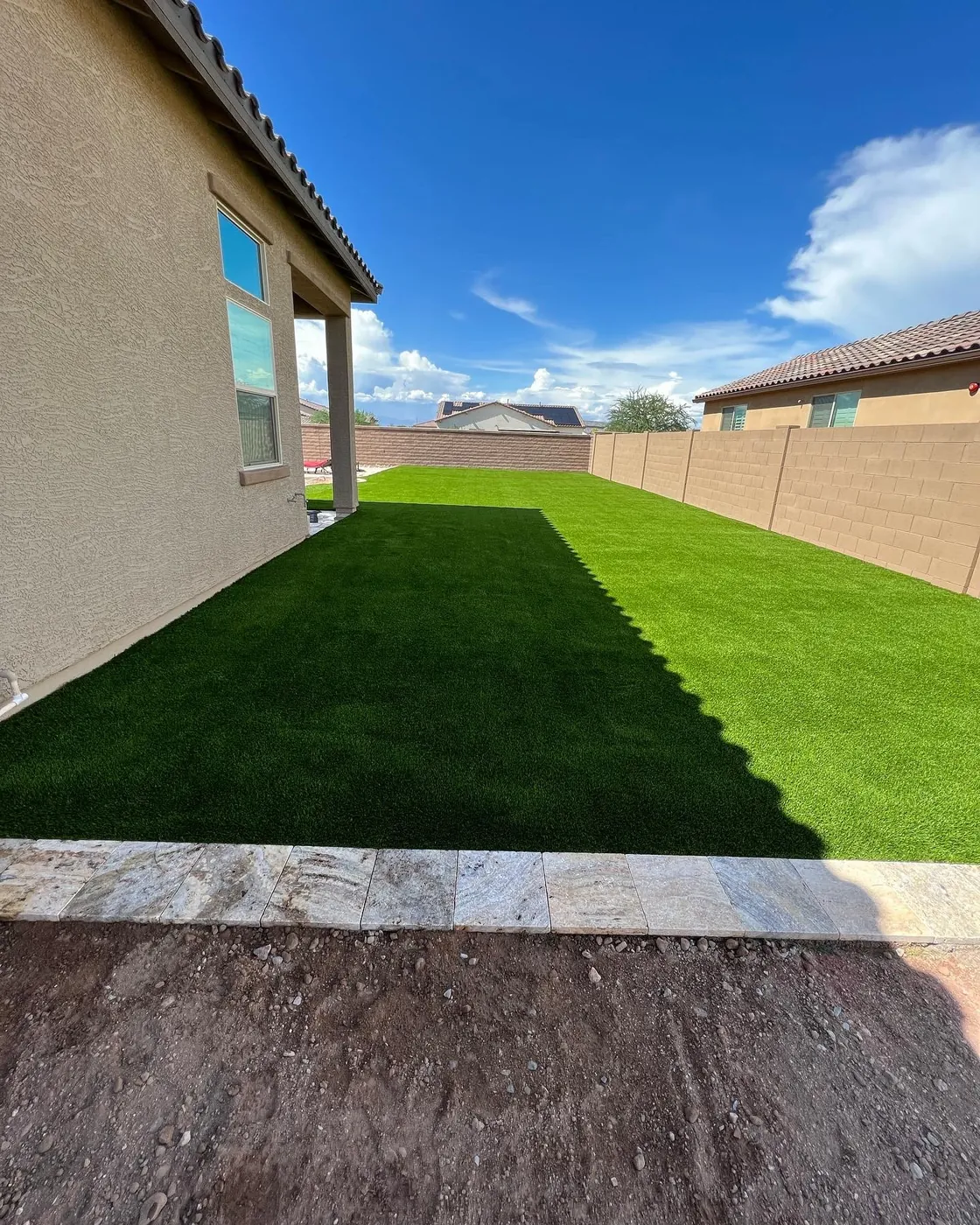 Turf strip run along the side of the house