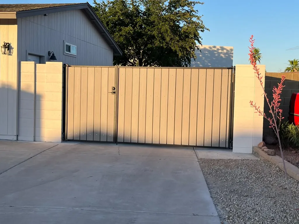 Finished drive and gate at the front of the house