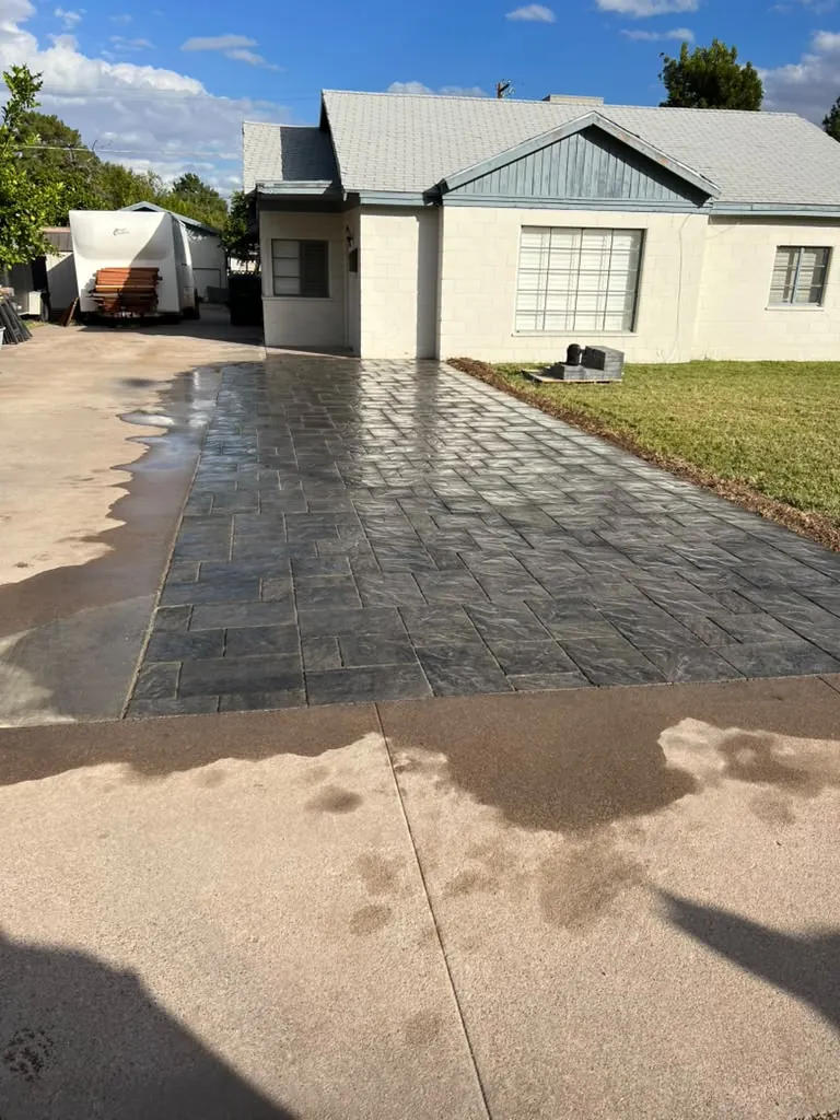 Paver driveway finished to the garage door